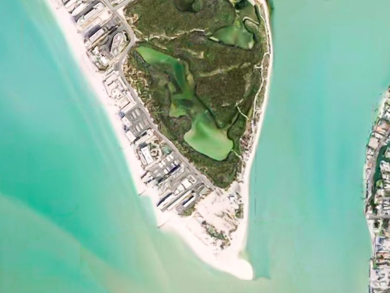 Aerial view of Lido Key, a coastal area with beaches and green spaces.